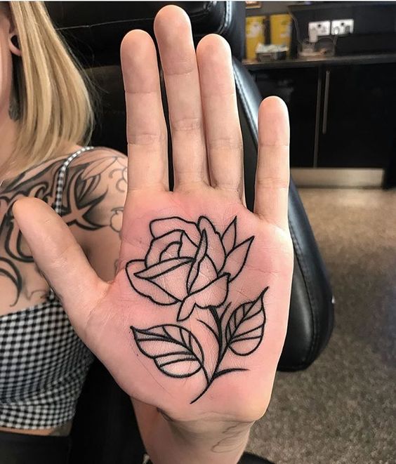 tatuagem palma mão rosa