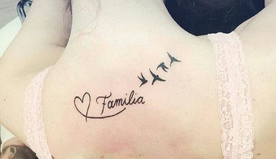 tatuagens costas animais escritas familia
